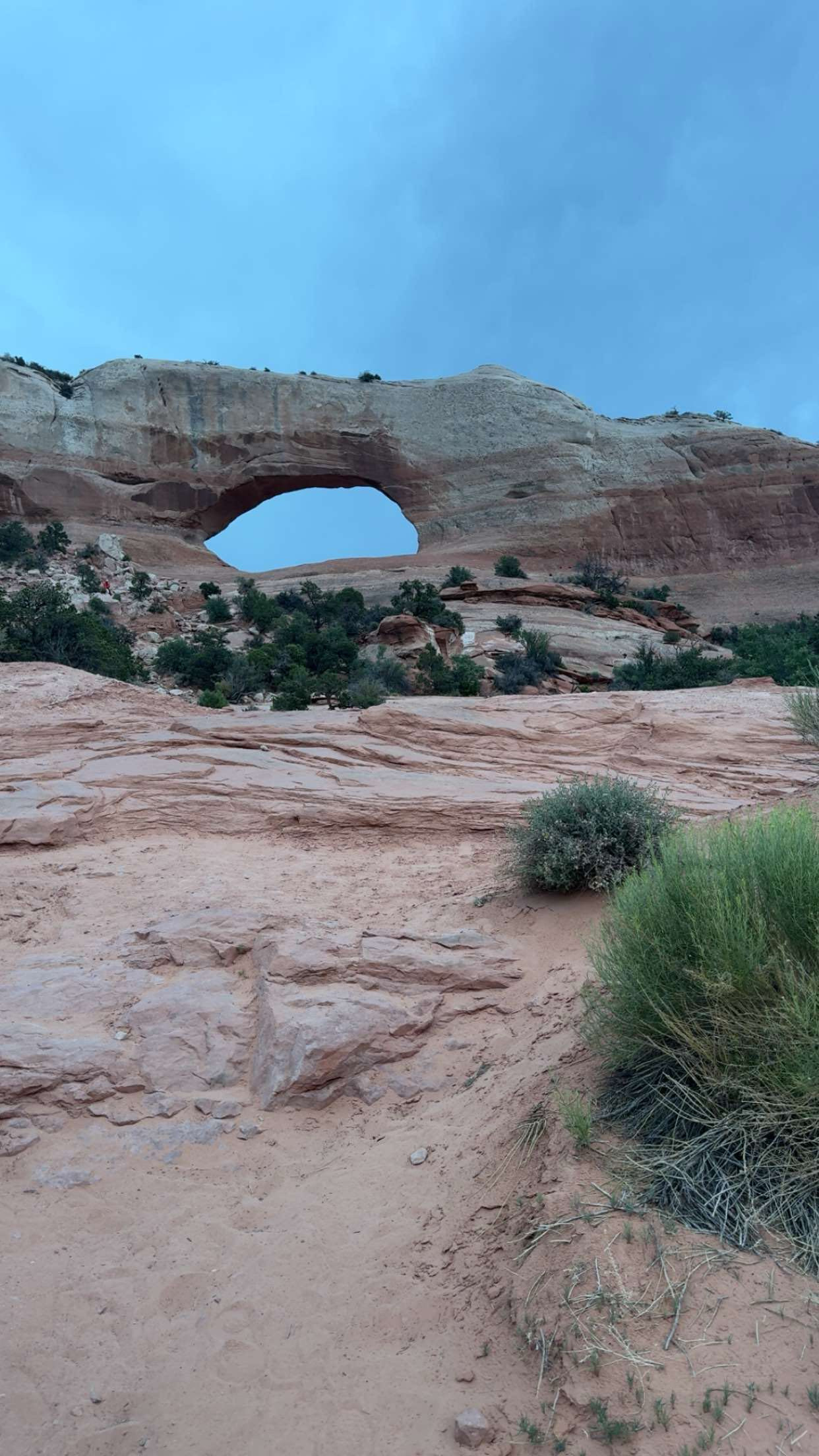 Rock arch formation by the highway in Utah